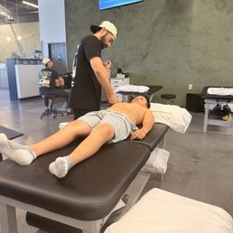 Massaging the area of concern to release muscle tension and tightness