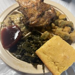 Thelma's Kitchen - Baked chicken, dressing with chicken gravy and cranberry sauce, fried okra, collard greens, corn bread.