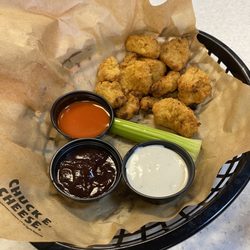 Chuck E. Cheese - The worst chicken wings (boneless) in my life! Yuck! Very dry and weird inside. Says - 8 pieces. Not sure about that...
