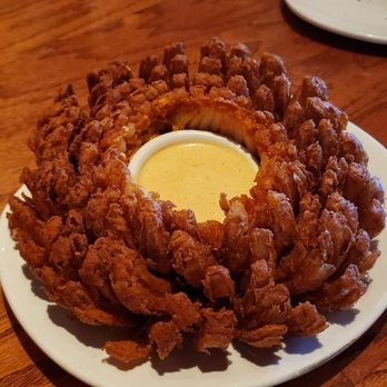 Outback Steakhouse - Blooming onion.. was good until we saw there was a fried piece of hair at the bottom. - Steakhouses Near Me - Buena Park, California Outback Steakhouse - Blooming onion.. was good until we saw there was a fried piece of hair at the bottom. - Steakhouses Near Me - Buena Park, California