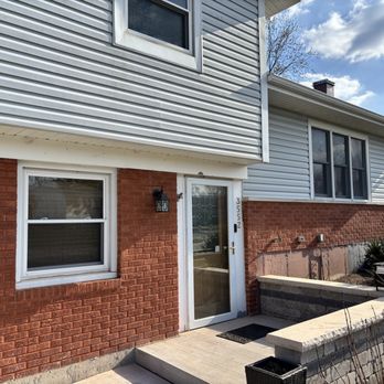 Jack Tuckpointing and Masonry - Tuckpointing front wall (orange color) - General Contractors Near Me - Hoffman Estates, Illinois Jack Tuckpointing and Masonry - Tuckpointing front wall (orange color) - General Contractors Near Me - Hoffman Estates, Illinois