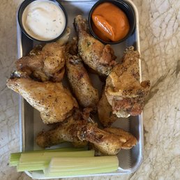 Lemon pepper wings with hot sauce and ranch on the side