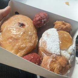 Strawberry filled donut, Cheesecake with Apple filled, and red velvet/ lemon donut holes. Strawberry filled donut, Cheesecake with Apple filled, and red velvet/ lemon donut holes.