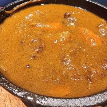 Chubby Curry - The Chubby Curry, in small cast iron pot served with a side bowl of rice and broccoli - Japanese Curry Near Me - Beverly Hills, California Chubby Curry - The Chubby Curry, in small cast iron pot served with a side bowl of rice and broccoli - Japanese Curry Near Me - Beverly Hills, California