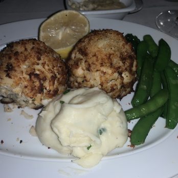 Steak 48 - Maryland Style Lump Crab Cakes* with whipped mashed Whipped Potatoes**and Sugar Snap Peas** - Steakhouses Near Me - Houston, Texas Steak 48 - Maryland Style Lump Crab Cakes* with whipped mashed Whipped Potatoes**and Sugar Snap Peas** - Steakhouses Near Me - Houston, Texas