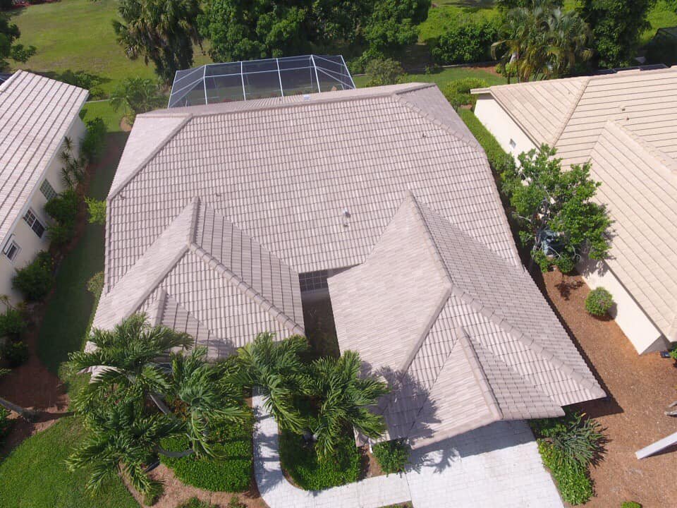 Slide of Boss Roofing Experts