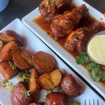 Bibo's Bistro & Bar - Bistro wings and potato wedges - Vietnamese Near Me - Houston, Texas Bibo's Bistro & Bar - Bistro wings and potato wedges - Vietnamese Near Me - Houston, Texas