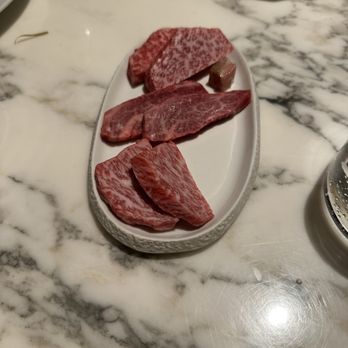 Bazaar Meat by José Andrés - The Wagyu tasting before cooking.  The small cube is just fat that they use to coat the hot rock too cook - Steakhouses Near Me - Las Vegas, Nevada