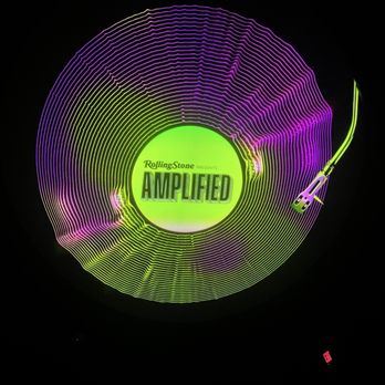 ARTECHOUSE - Giant record on the ceiling for Rolling Stone Amplified exhibit - Art Museums Near Me - Houston, Texas