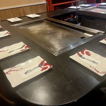 Saitos's Japanese Steakhouse - Hibachi table with pretty plates - Japanese Near Me - Dania Beach, Florida Saitos's Japanese Steakhouse - Hibachi table with pretty plates - Japanese Near Me - Dania Beach, Florida
