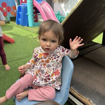 Del Norte Child Care - Enjoying playing in the back yard. Saying hi. - Child Care & Day Care Near Me - El Cerrito, California Del Norte Child Care - Enjoying playing in the back yard. Saying hi. - Child Care & Day Care Near Me - El Cerrito, California