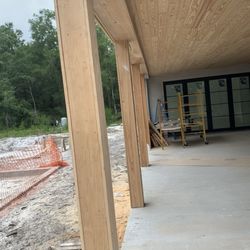 K J and Sons Construction - Beams post and ceilings all with finished wood material