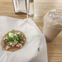 Nacho's Taqueria - Delicious chicken taco with sour cream, onions, & cilantro .. only $2!