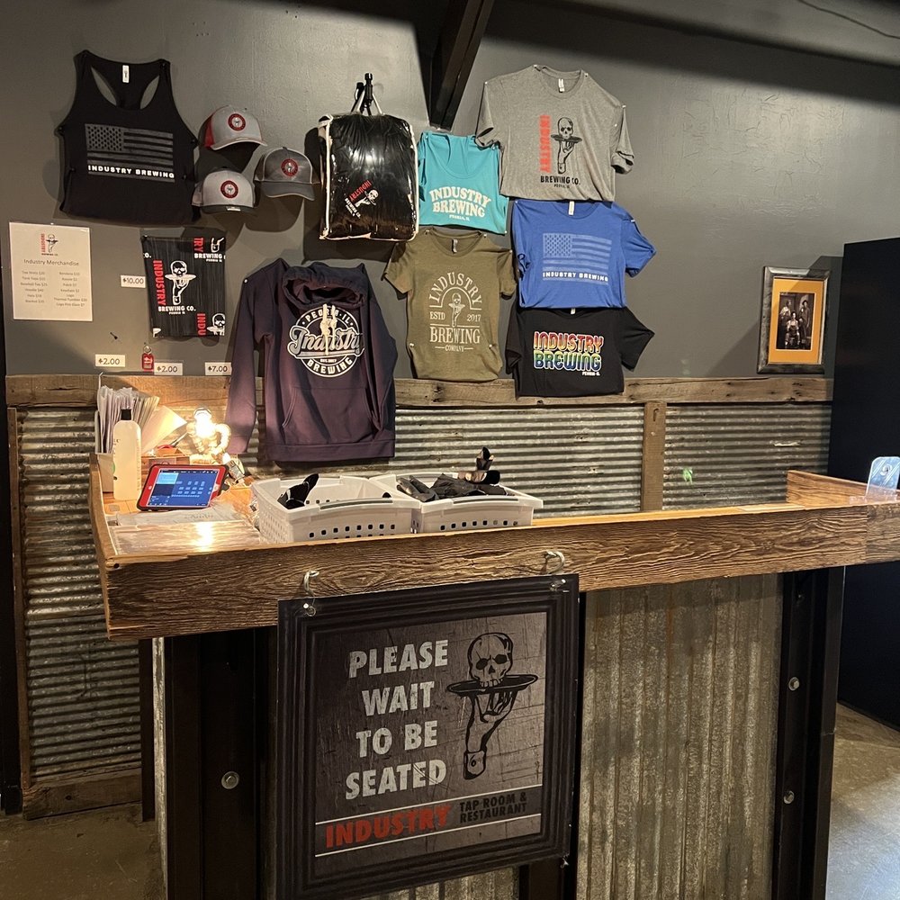 Industry Brewing - bar with a sign that says please please to be seated - Breweries Near Me - Peoria, Illinois Industry Brewing - bar with a sign that says please please to be seated - Breweries Near Me - Peoria, Illinois