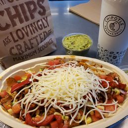 Chicken Al Pastor bowl and a side of guac and chips