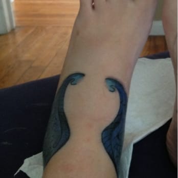 Ironclad Tattoo - Describe my photo? There lays the largest kankle you've ever seen on a thin, white girl, I imagine. - Tattoo Near Me - Troy, Michigan