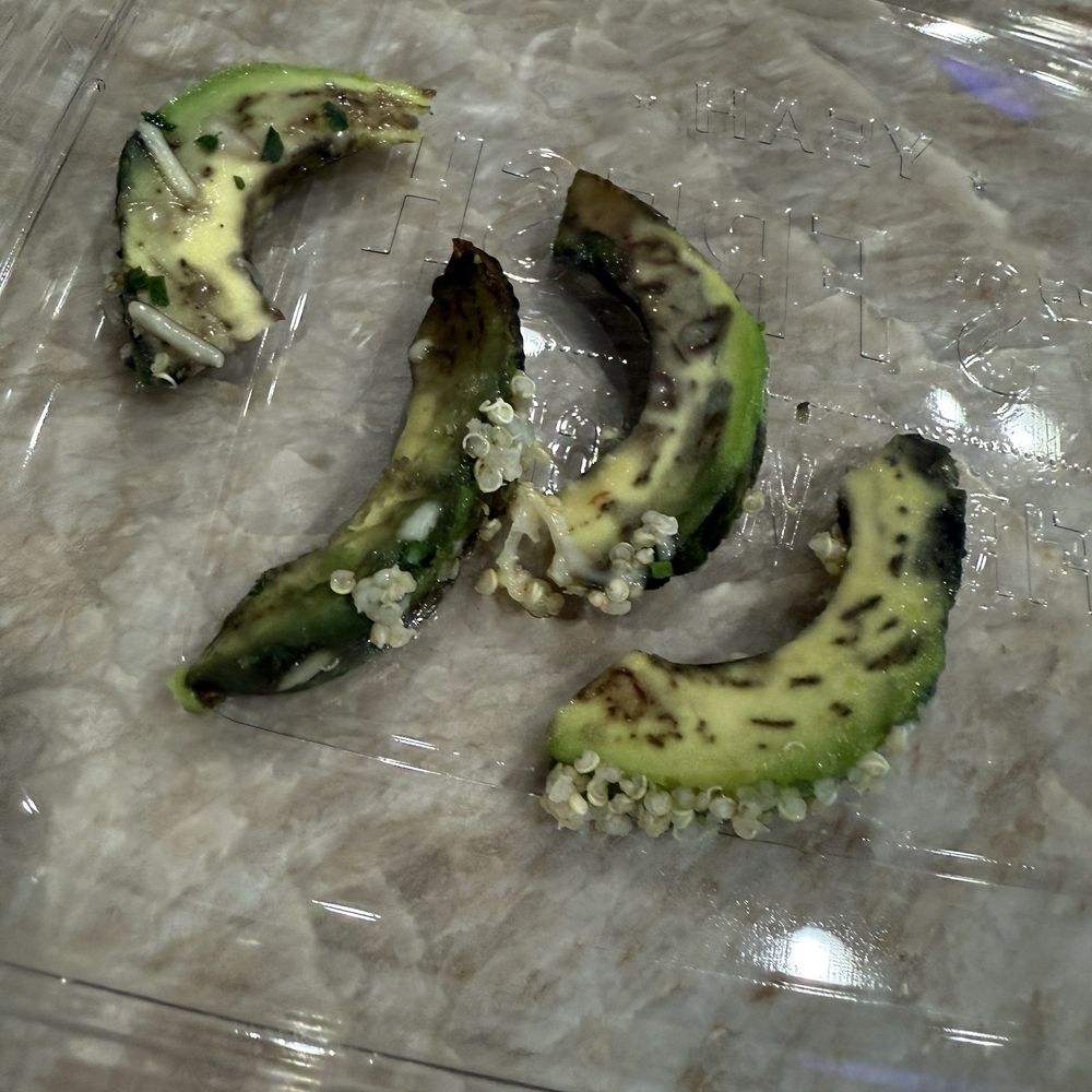 Rotten avocados from one of our meals at time of delivery . Rotten avocados from one of our meals at time of delivery .