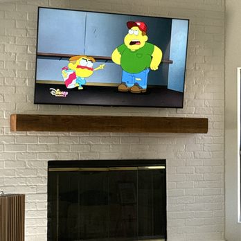 Connect Works - 65 inch tv over fireplace with outlet. - TV Mounting Near Me