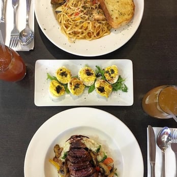 Sage Bistro - Cajun seafood pasta, deviled eggs, roasted duck breast, grapefruit iced tea to the left, and guava iced tea to the right. - American Near Me - Alhambra, California Sage Bistro - Cajun seafood pasta, deviled eggs, roasted duck breast, grapefruit iced tea to the left, and guava iced tea to the right. - American Near Me - Alhambra, California