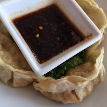 Rakuu - fried pork dumplings! options available: steamed, pan fried, fried - Sushi Bars Near Me - Spring, Texas