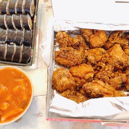 2 rolls Gogi Kimbap, small tteokbokki, garlic plus chicken 2 rolls Gogi Kimbap, small tteokbokki, garlic plus chicken