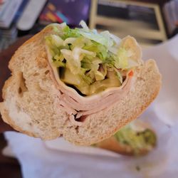 Eros Gourmet Pizza & Deli - Barely any turkey in a $14 buck sandwich.