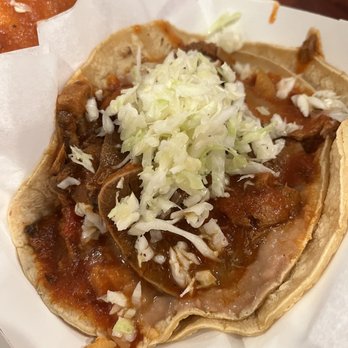 Taqueria El Milagro - Lengua (beef tongue) in red sauce taco - Mexican Near Me - Chicago, Illinois Taqueria El Milagro - Lengua (beef tongue) in red sauce taco - Mexican Near Me - Chicago, Illinois