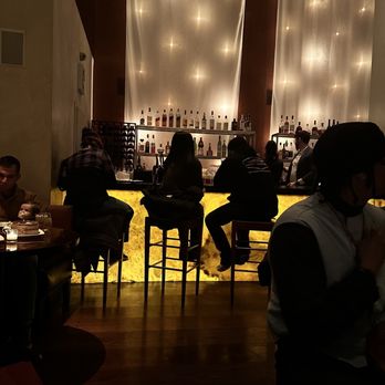 Buddakan - a group of people sitting at a bar - Asian Fusion Near Me - Philadelphia, Pennsylvania Buddakan - a group of people sitting at a bar - Asian Fusion Near Me - Philadelphia, Pennsylvania