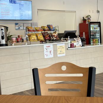 KBBQ Spot - Checkout area- noodles and hot water dispenser for the noodles - Korean Near Me - Marietta, Georgia KBBQ Spot - Checkout area- noodles and hot water dispenser for the noodles - Korean Near Me - Marietta, Georgia