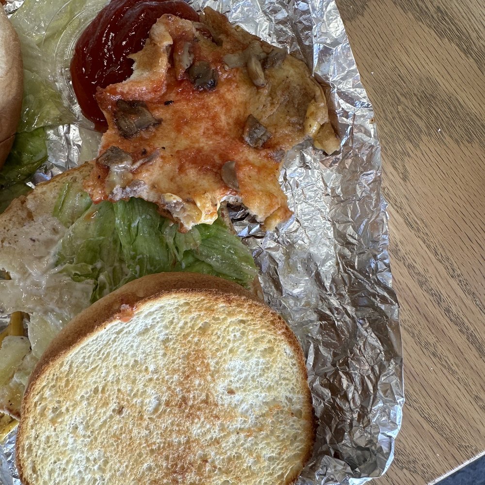 The soggy bun it came with vs the new one I had to ask for.