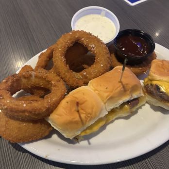 Duke's Bar & Grill - Beef sliders with onion rings - American Near Me - Riverside, California Duke's Bar & Grill - Beef sliders with onion rings - American Near Me - Riverside, California