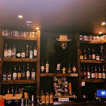 Tinker Street Tavern - shelves full of beer bottles - Burgers Near Me - Woodstock, New York