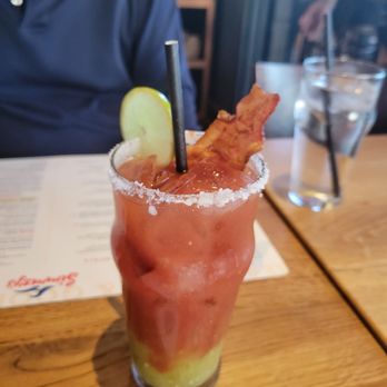 Simmzy's - Their version of a Bloody Mary. The drink was tasty and creative, but the bacon needed to be crispy. - Pubs Near Me - Huntington Beach, California Simmzy's - Their version of a Bloody Mary. The drink was tasty and creative, but the bacon needed to be crispy. - Pubs Near Me - Huntington Beach, California