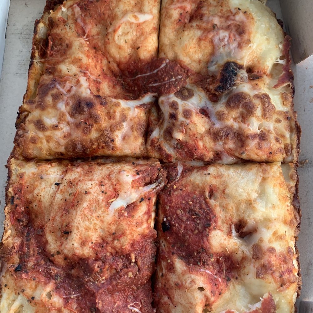 Supposed to be a cheese pizza?? Looks like someone just picked off the pepperoni. Supposed to be a cheese pizza?? Looks like someone just picked off the pepperoni.