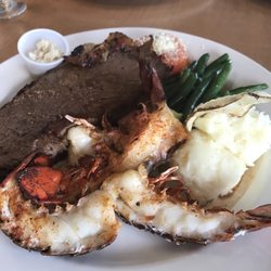 Favourites Dining Room - 2 lobster tails and 8 oz. prime rib for $20. $30 for non-members