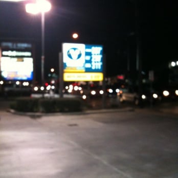 Valero - a parking lot at night with a lot of cars - Convenience Stores Near Me - Houston, Texas Valero - a parking lot at night with a lot of cars - Convenience Stores Near Me - Houston, Texas