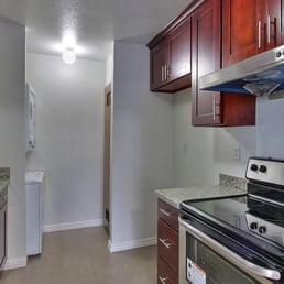 a kitchen with granite countertops
