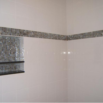 JDS Floor Concepts, Inc - a white tiled shower - Flooring Near Me - Naples, Florida