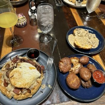 The Bellwether - Loaded Waffle Side of Smash Fried Potatoes Side of Biscuit and Gravy Bottomless Mimosa - Cocktail Bars Near Me - St. Louis, Missouri The Bellwether - Loaded Waffle Side of Smash Fried Potatoes Side of Biscuit and Gravy Bottomless Mimosa - Cocktail Bars Near Me - St. Louis, Missouri