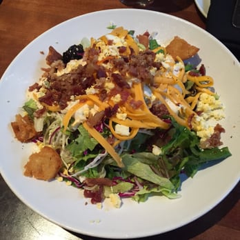 Stoney River - House Salad with ranch minus the tomatoes and cucumbers. - Steakhouses Near Me - Atlanta, Georgia
