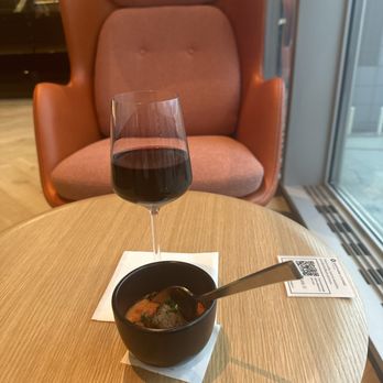 Etihad Lounge - Food from buffet and very good red wine. - Airport Lounges Near Me - Dulles, Virginia