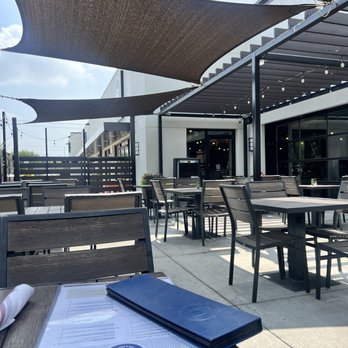 The '401 - Partially shaded patio - American Near Me - Bellaire, Texas