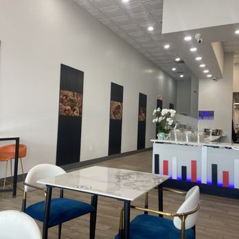 Pokehub Venice - The dining area and service counter. You could eat off the floor in this place. - Poke Near Me - Venice, Florida Pokehub Venice - The dining area and service counter. You could eat off the floor in this place. - Poke Near Me - Venice, Florida