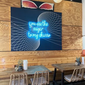 Angels Churros N Chocolate - Wall color - Desserts Near Me - Cypress, Texas Angels Churros N Chocolate - Wall color - Desserts Near Me - Cypress, Texas