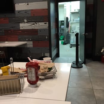 Smashburger - It's hard to tell from this angle but the kitchen floor was just as dirty as the restaurant floor. - Burgers Near Me - Wantagh, New York Smashburger - It's hard to tell from this angle but the kitchen floor was just as dirty as the restaurant floor. - Burgers Near Me - Wantagh, New York