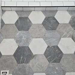 Strickler Carpet - The tile selections in this bathroom really brightened and modernized this bathroom