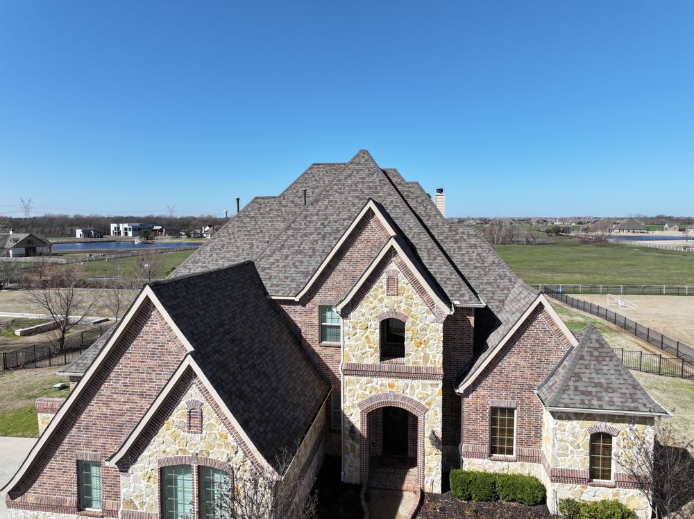 Slide of New Elite Roofing