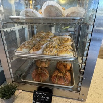 Dzui's Cakes & Desserts - Display case with assorted pork puns. - Bakeries Near Me - San Jose, California Dzui's Cakes & Desserts - Display case with assorted pork puns. - Bakeries Near Me - San Jose, California