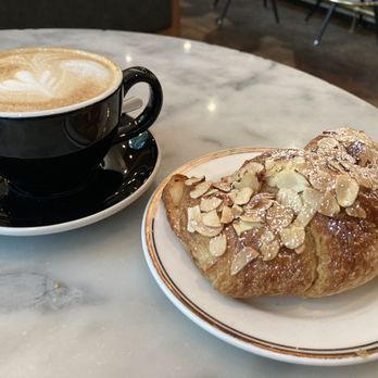 Mr West Cafe Bar Downtown - Almond Croissant and Cappuccino - Bars Near Me - Seattle, Washington Mr West Cafe Bar Downtown - Almond Croissant and Cappuccino - Bars Near Me - Seattle, Washington