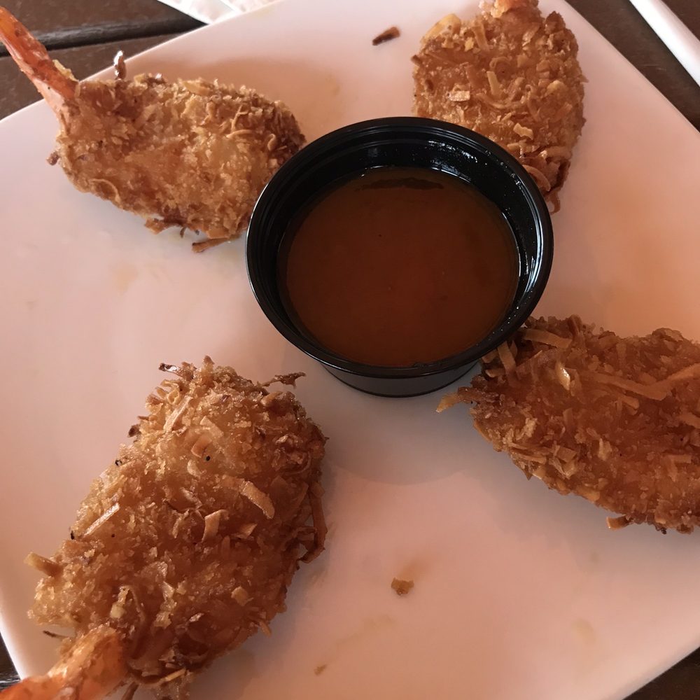Coconuts On The Beach - Coconut Shrimp starter (actually comes w/5...we were hungry ) - Bars Near Me - Cocoa Beach, Florida